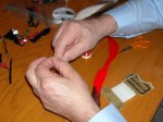 Larry Brown Demonstrates tying by hand.